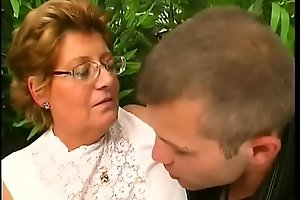 Very fat lady gets her hairy cunt drilled by young dude