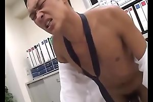 Suited Asian stud getting blown in his