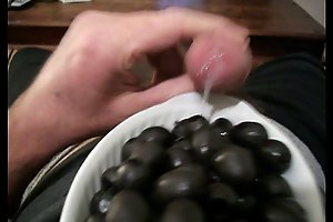 black olives tapa with dressing / tapa..